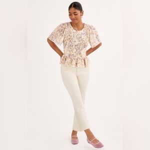 CAbi Floral Smocked Peplum Top in Cream and Lavender